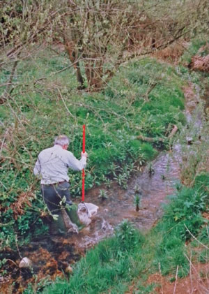 Dr Chris Terrel-Nield of Nottingham-Trent Uni, kick sampling and identifying freshwater invertebrates from the brook; 1997